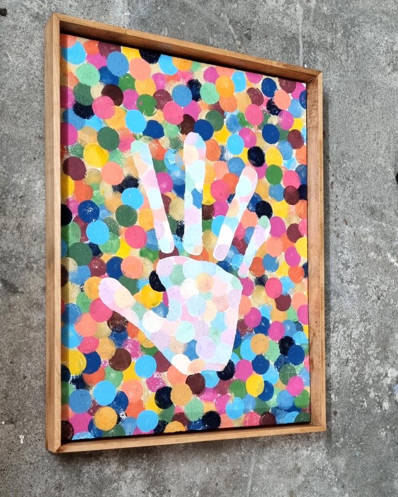 Kunstwerk mit Handabdruck