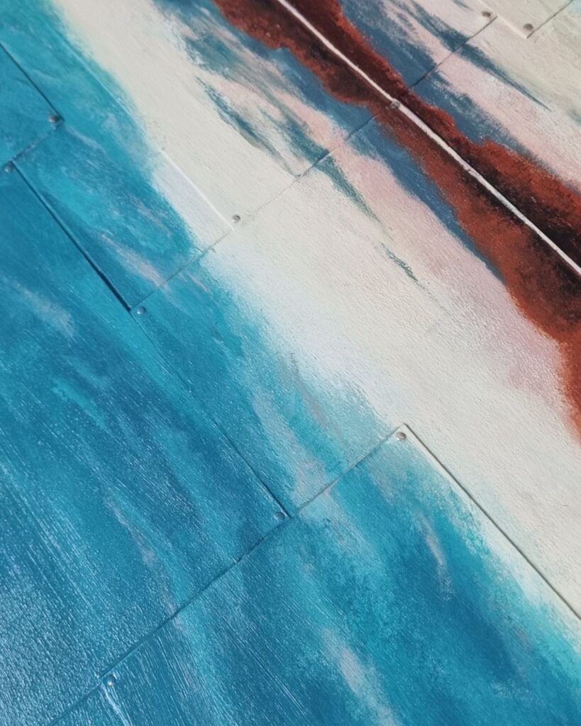 Malerei eines Sonnenaufgangs mit Spiegelung im Wasser. Künstlerin Annett Wagner